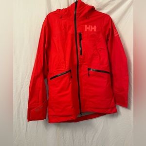 BRAND NEW Helly Hansen ski jacket. The tags were cut off but never worn.